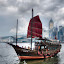 Hong Kong - Sampan by Fabrizio Vendramin - Transportation Boats ( water, hong kong, skyline, victoria harbour, aqua luna, sampan, cloud, boat, china )