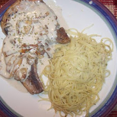 Pork Chop Saute With Caramelized Onions and Balsamic Dijon Cream