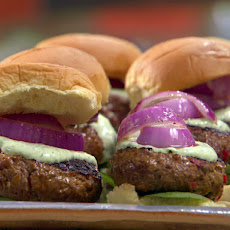 Indian Lamb Burgers with Green Raita Sauce and Red Onions
