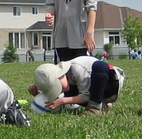 BigE with his ear on the soccer ball