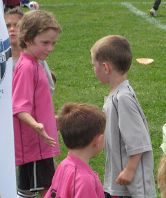 BigE shaking hands with the pink panthers