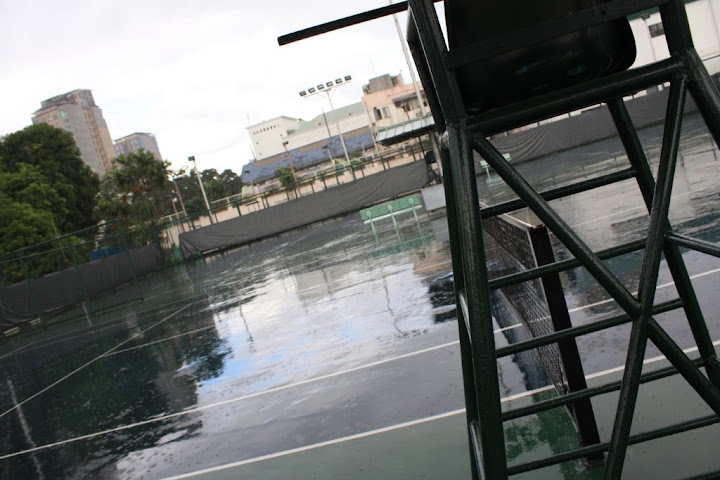 It rained for the first 15 minutes and we had to wait for another 15 to allow the court to get cleaned up and dry.