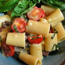Pasta With Brie, Tomatoes, Olives, and Basil