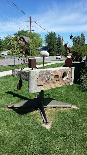 Abstract Stone and Steel Spinning Sculpture