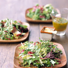 Greens with Orange Vinaigrette and Toasted Sesame Seeds