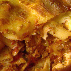 Pasta Timballo Layered With Eggplant, Bolognese Ragu, Hardboiled Egg And Scamorza Cheese