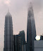 Phil and Steve Get into Shanghai by the Magnetic Levitation Train and a Taxi. Here is the tallest building in the world (460m): the Shanghai World Financial Tower, next to the Jin Mao tower. I departed from the cab to take a photo - I believe that made Phil nervous...http://i2.tinypic.com/s664xy.jpg
