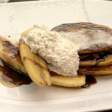 Pumpkin Pancakes with Root Beer Syrup, Caramelized Bananas, and Cinnamon Whipped Cream