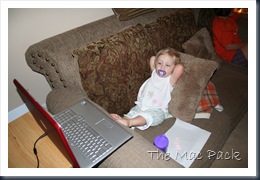 20080830 - Savannah Watching Dora on Laptop on Couch (2)