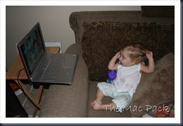 20080830 - Savannah Watching Dora on Laptop on Couch (5)