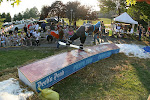 Frank the Tank rides the edge of the c-box at the Mentor, OH rail jam.  Suburban Blend and snowrev.com were there too.