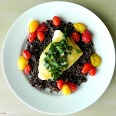 Sea Bass with Salsa Verde, Sauteed Cherry Tomatoes, and Black Quinoa