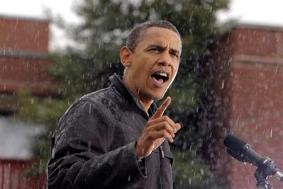 Democratic presidential candidate Sen. Barack Obama, D-Ill. addresses supporters in rain at a rally in Chester, Pa., Tuesday, Oct. 28, 2008. (AP Photo/Jae C. Hong) 