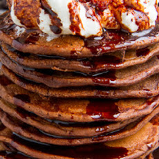 Bacon Guinness Chocolate Pancakes with a Frothy Whipped Cream Head and Guinness Chocolate Syrup