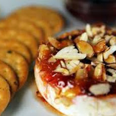 Baked Brie Stuffed With Strawberry Preserves and Toasted Almonds