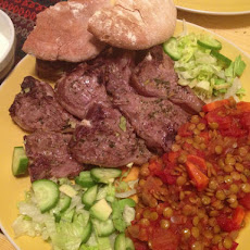 Lamb loin chops with lentils in the tomato sauce