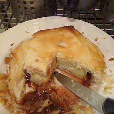 Crescent Wrapped Baked Brie With Apricots, Cranberries & Alm