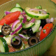 Cucumber Tomato Salad with Zucchini and Black Olives in Lemon Balsamic Vinaigrette
