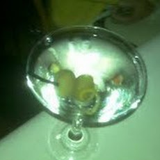 Citrus and olive martini