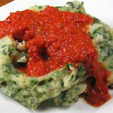 Baked Spanish Spinach Balls in Roasted Bell Pepper Sauce (Albond