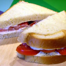 2- Handed Kitchen Sink Tomato Sandwich