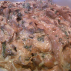 Chanterelles With Cream Atop Goat Cheese Crostinis