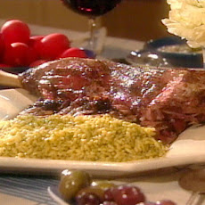Roasted Leg of Lamb with Saffron and Olive Salsa