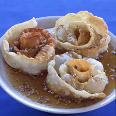 Fried Pastry Spirals with Honey, Sesame, and Walnuts