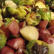 Pan-Roasted Brussel Sprouts with New Potatoes, Onions, and Crispy Parmesan