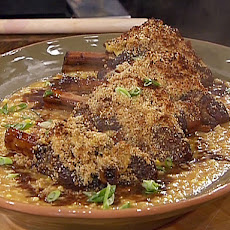 Braised and Roasted Domestic Lamb Shanks with Gorgonzola Crust, Sweet Corn-Tomato Risotto, and Lamb Braising Juices