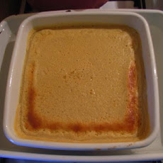 Lemon Buttermilk Pudding Cake With Fresh Berries