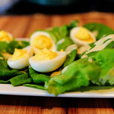 Deviled Eggs on a Nest of Butter Lettuce with Honey Mustard Dressing