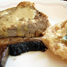 Pepper Steak With Butter Bean Mash and Portabella Mushrooms.