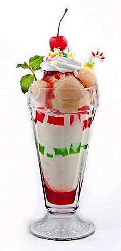 Swensens Christmas Ice cream sundae Tinsel Castle Candy Canes, Vanilla Ice cream, Strawberry sauce, green jelly, red lychees.