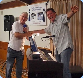 Murray Hancox receiving a big round of applause and thank you from President, Gordon Sutherland, for his fantastic concert. Photo courtesy of Dennis Lyons.