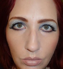 wearing 3D Eyeshadow in irresistible  midnight date from essence cosmetics