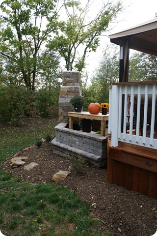 patio with stone walls