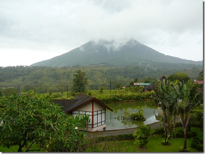 Jan 30, 2012: morning view of Mt Arenal from the porch of our cabin at Montaña del Fuego hotel - 14 min later than the previous, this is the clearest view we had