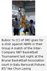 Buboy Yu (C) of IMD goes for a shot against ABMS in their Group A match of the Inter-Company NBT Basketball Tournament last night at the Brunei Basketball Association court in Batu Bersurat.Picture: BT/ Yee Chun Leong 