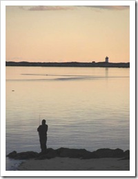 11.2011 sun setting lighthouse fisherman west end provincetown