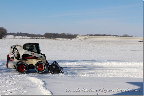 plowing snow on farm