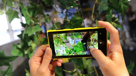 IMAGE DISTRIBUTED FOR NOKIA - The Nokia Lumia 1020 smartphone is displayed during an announcement event in New York, Thursday, July 11, 2013.  The Nokia Lumia 1020 reinvents zoom with a 41-megapixel camera featuring Zeiss optics, six lenses, optical image stabilization and allows for clear pictures in low light conditions.  (Photo by Diane Bondareff/Invision for Nokia/AP Images)
