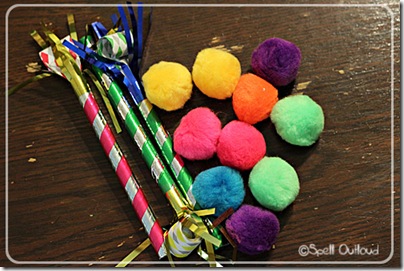 party-blowers-and-pom-poms