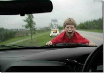 child on car