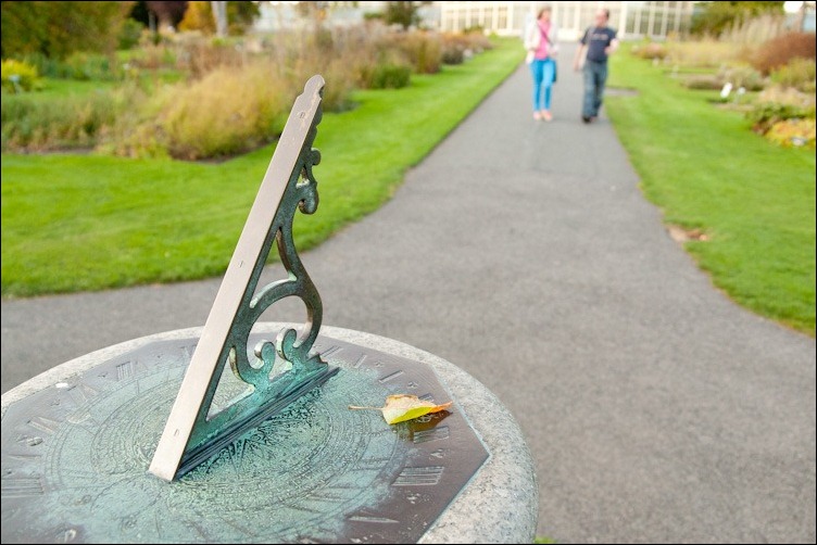 30/09/2011 -- DCU -- a sundial decorated with a deciduous leaf  on an alley leading to the main glasshouse in National Botanic Garden, Glasnevin Dublin. Photograph: Aleksander Szojda / DCU