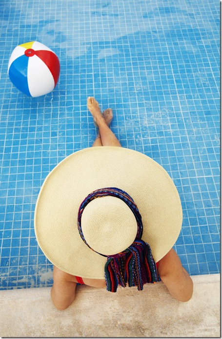 woman sitting in pool