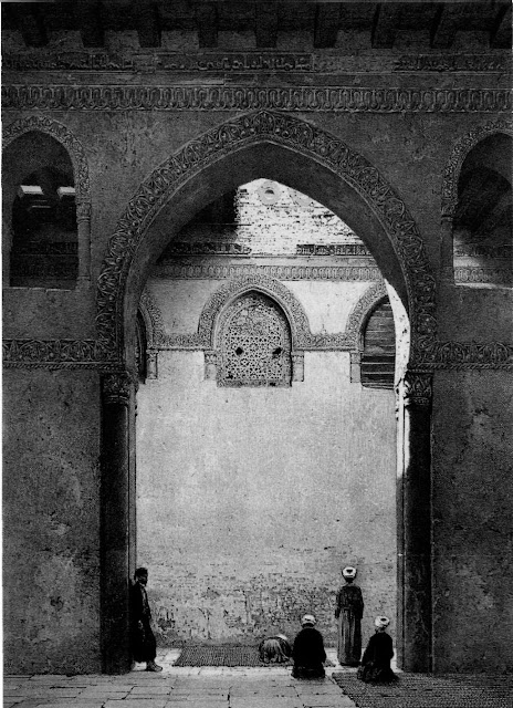Mosque of Ahmad ibn Tulun, arcade and interior windows, 9th century. Prostrating men provide scale and accentuat the arcade's massiveness. Arches vary Irttle; they rest on brick pillars with a rectangular plan. Unobstructed interior windows and laced exterior windows form interesting contrasts, capturing the movement of air and light.