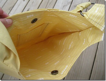 handmade yellow bag with metal snap