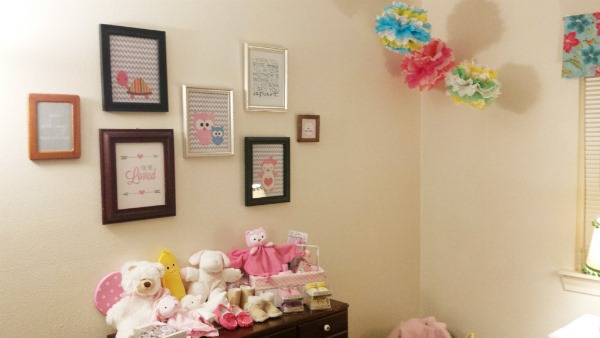 nursery gallery wall and poofs
