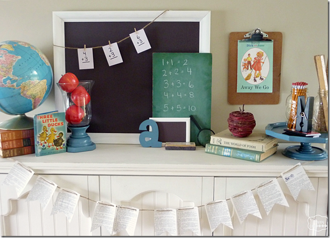 back-to-school-mantel-with-globe-chalkboards-vintage-books-apples-pencils-rulers-DIY-dictionary-page-buntings-at-thehappyhousie-1024x738